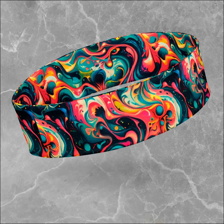 Women wearing colorful Jelly Kvlt sports headbands with cosmic patterns